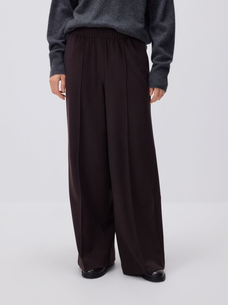 Wide leg trousers with pressed crease - dark brown - RESERVED