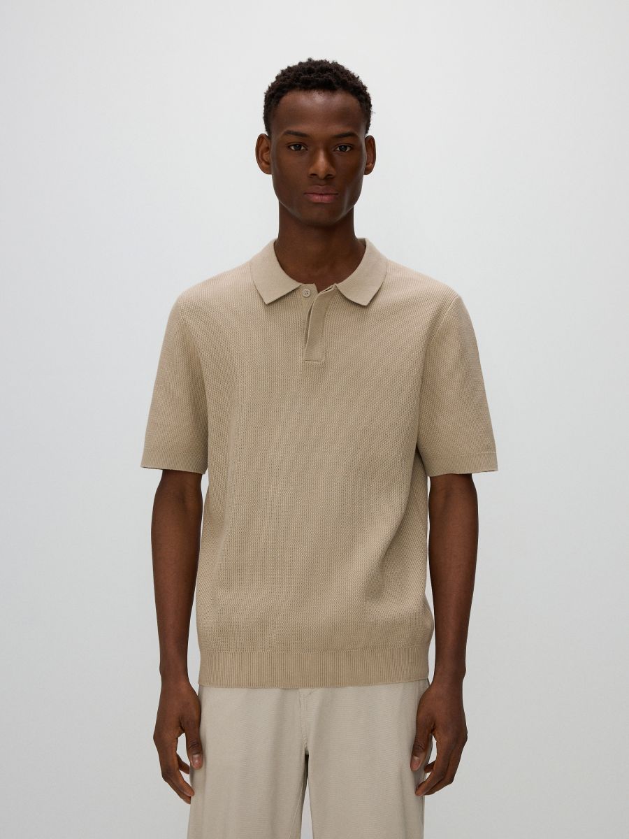 Pull style polo en coton majoritaire
