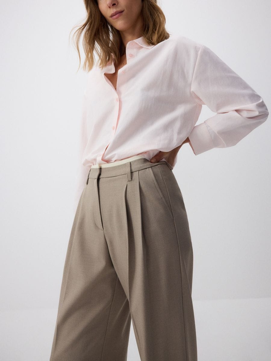 Trousers with contrast insert - beige - RESERVED - 4