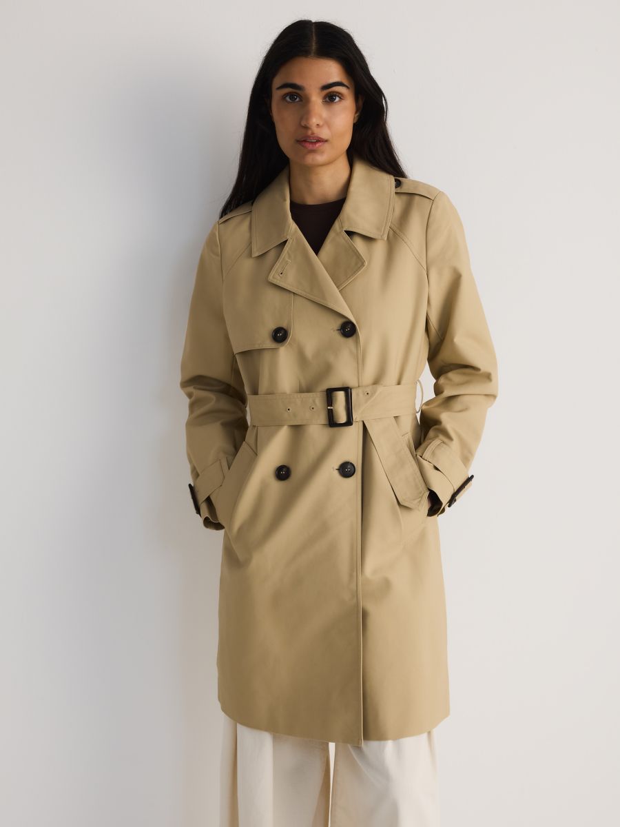 Double-breasted trench coat with belt - beige - RESERVED