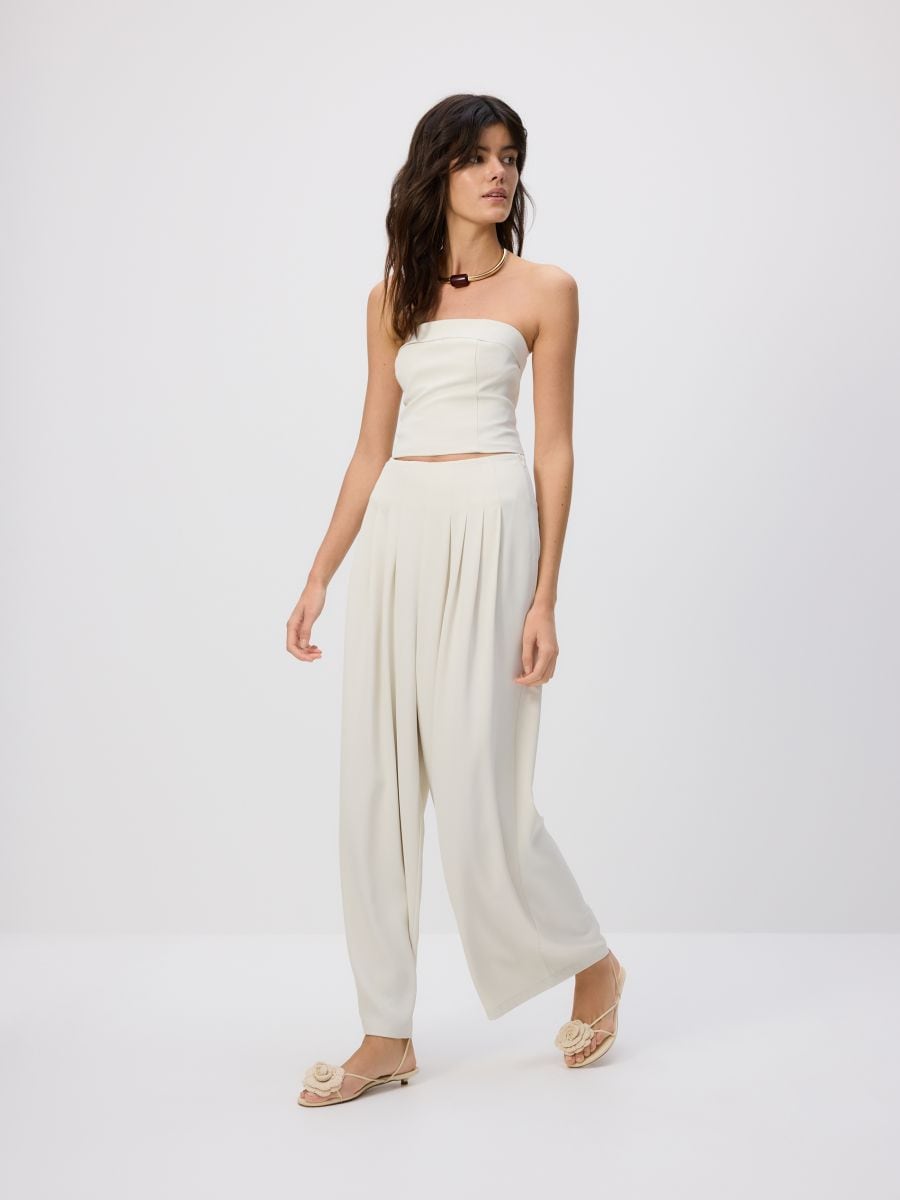 Pleated wide leg trousers - cream - RESERVED
