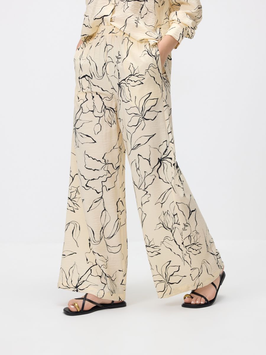 Patterned viscose trousers - multicolor - RESERVED - 2