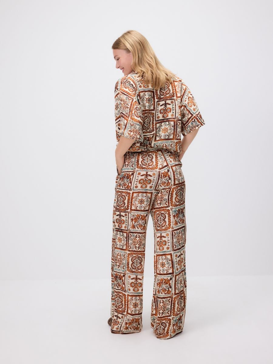 Patterned trousers - multicolor - RESERVED - 2