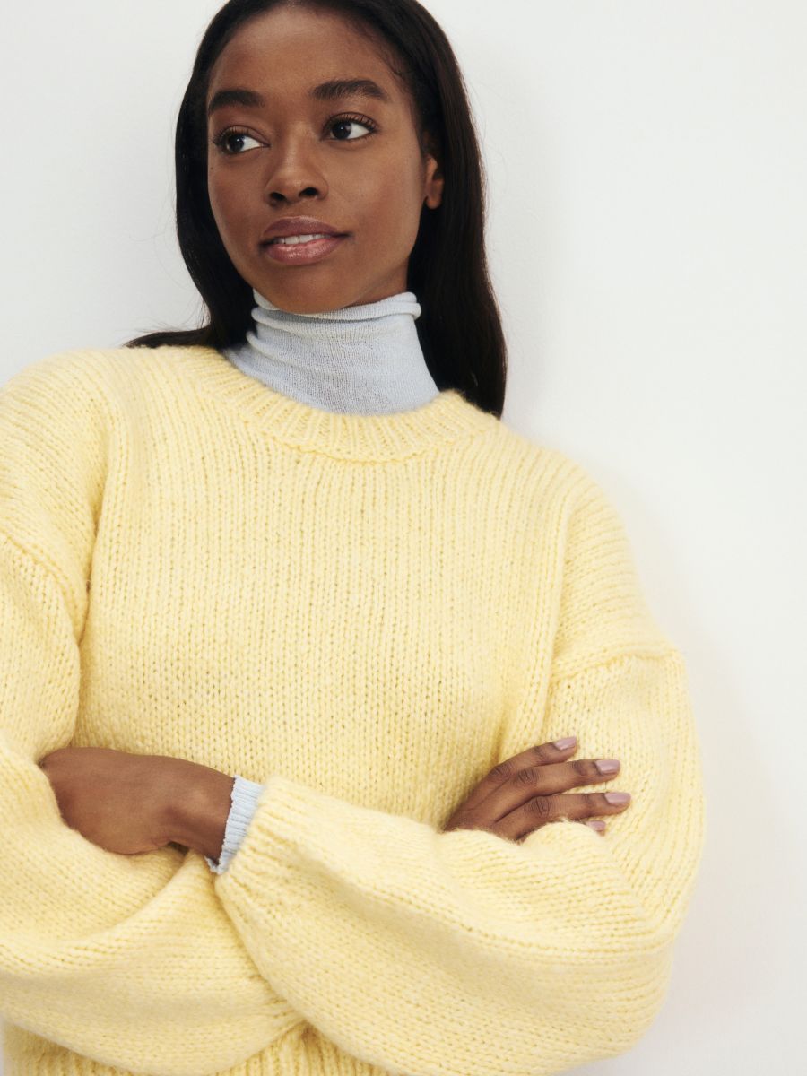 Pale yellow pullover on sale