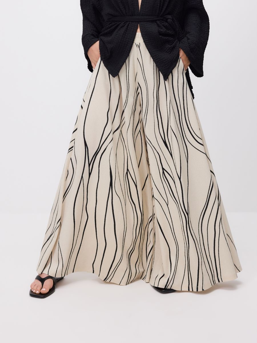 Loose trousers with pockets - multicolor - RESERVED - 2