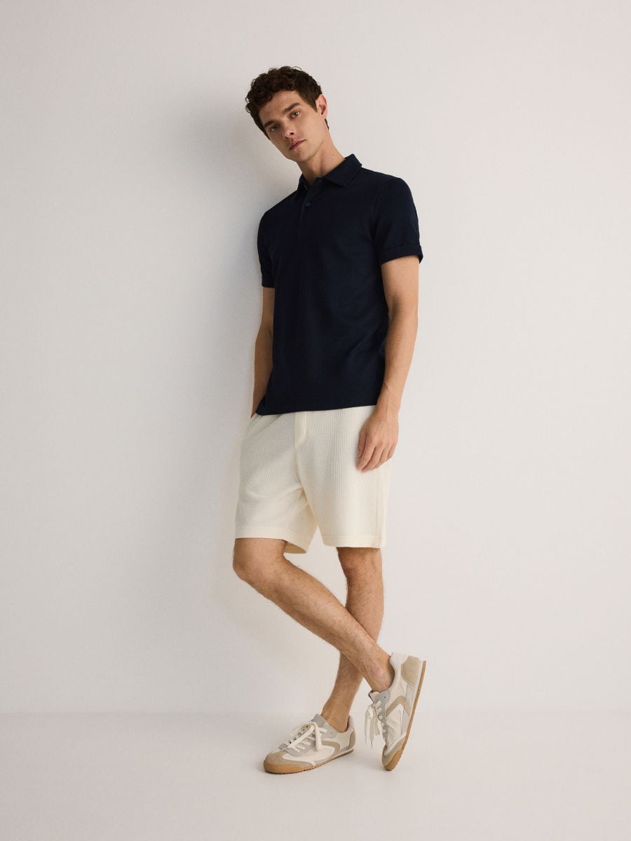 Regular fit poloshirt van structuurstof - marineblauw - RESERVED - 2