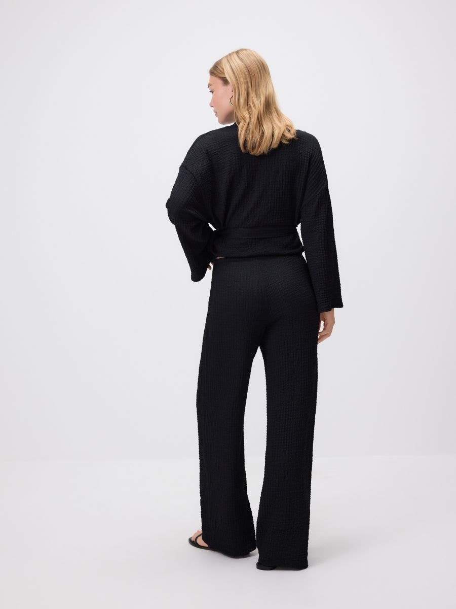 Crinkled knit trousers Color black - RESERVED - ZQ700-99X