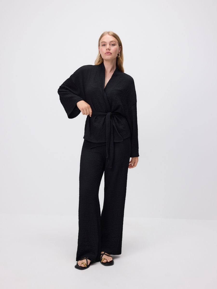 Crinkled knit trousers Color black - RESERVED - ZQ700-99X