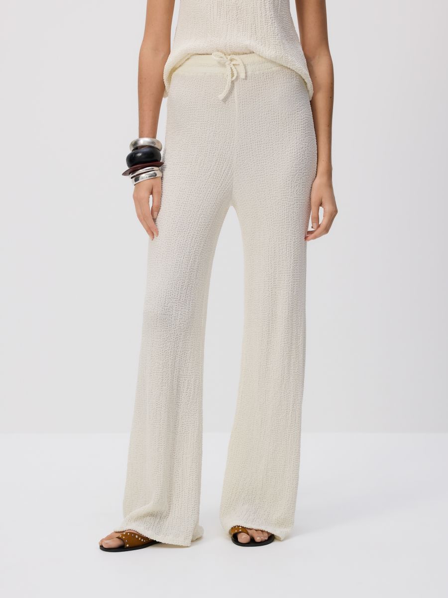 Crinkled flare trousers - cream - RESERVED - 2