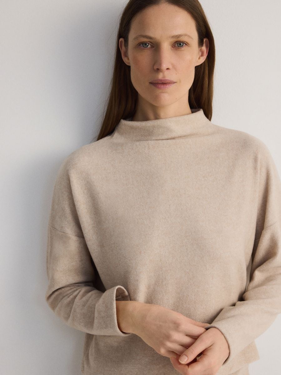 Jersey blouse with turtle neck - beige - RESERVED