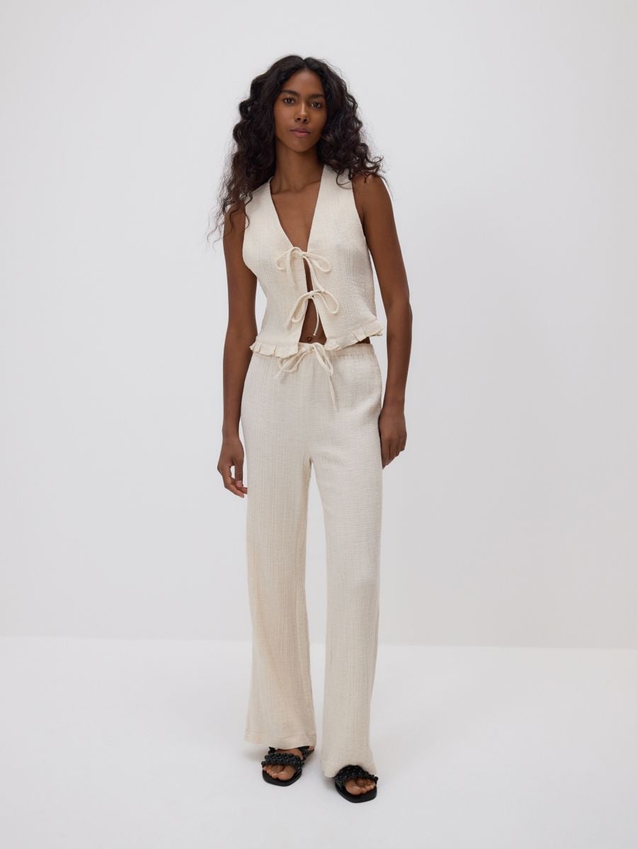 Trousers with linen blend - beige - RESERVED