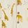 Cotton romper suit with giraffe pattern - nude