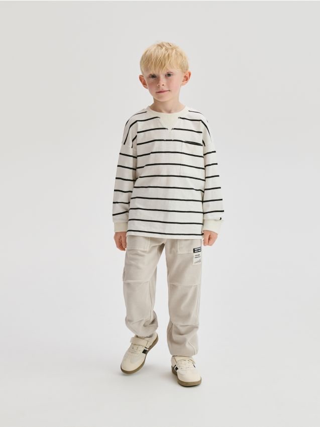 Reserved - Pantaloni jogger cu efect prespălat - bej