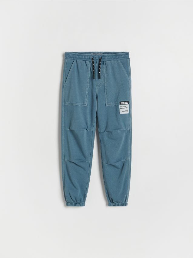 Reserved - Pantaloni jogger cu efect prespălat - Albastru metalizat