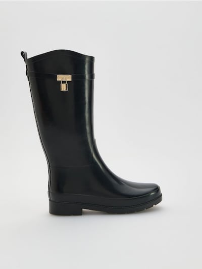 High upper Wellington boots with buckle