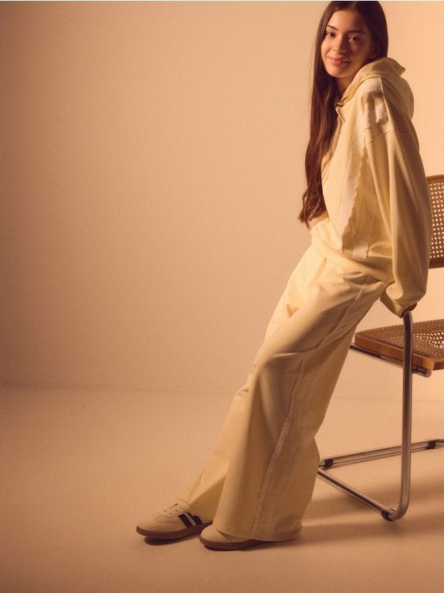 Jogging trousers with lace inserts - RESERVED