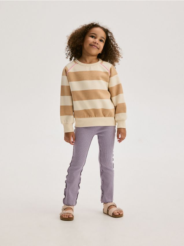 Flare trousers with ruffle details - RESERVED