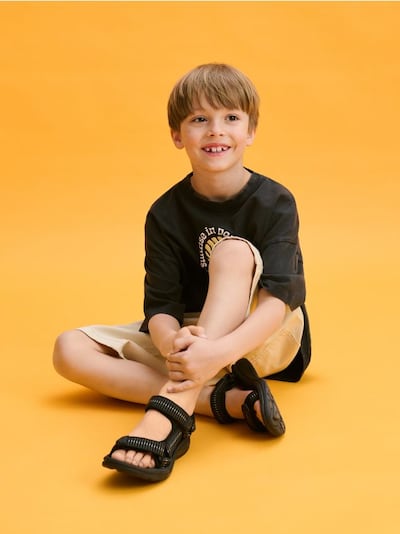 Sandals with velcro fastening