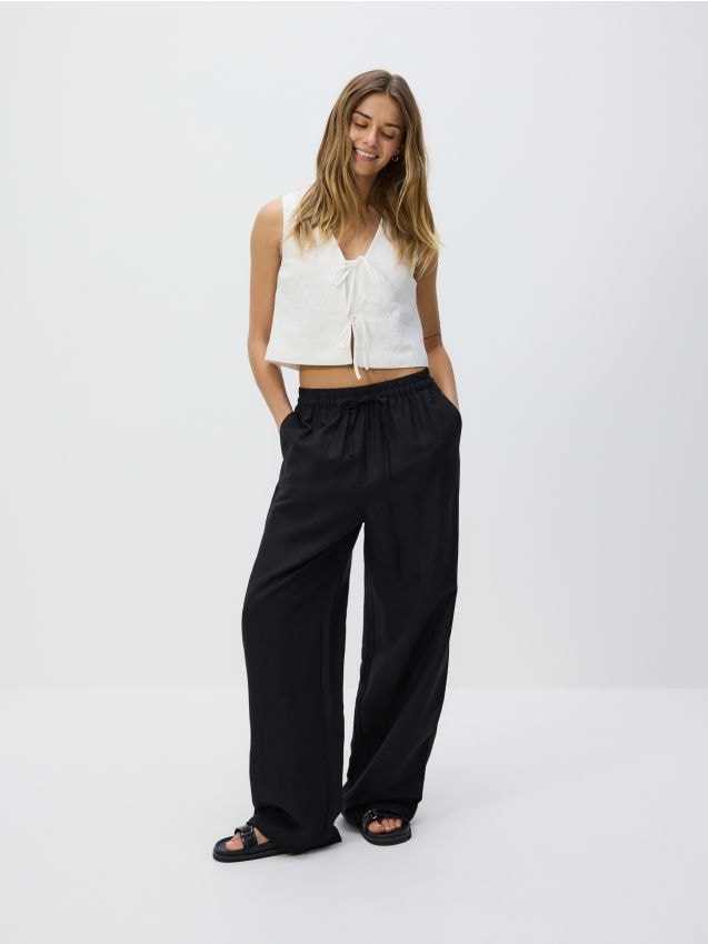 Loose linen trousers - RESERVED