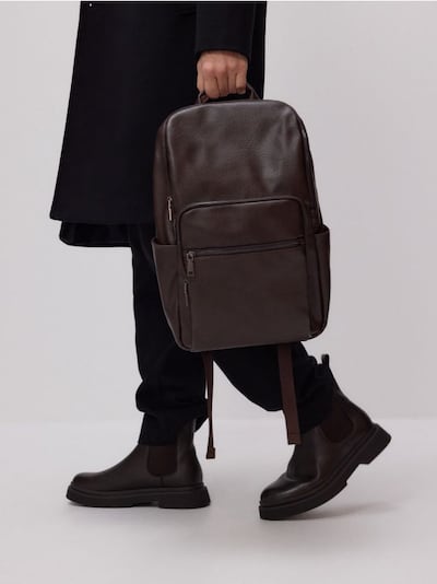 Large capacity backpack with pockets