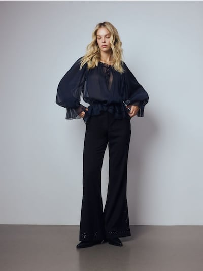 Trousers with decorative trim