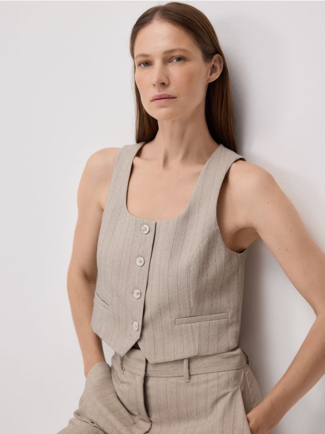 LADIES` VEST - RESERVED