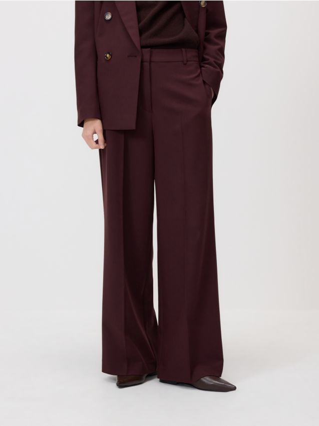 Pantalone sa širokim nogavicama na crtu - RESERVED