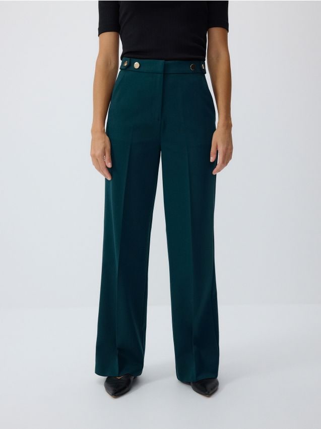 Loose trousers with crease - RESERVED