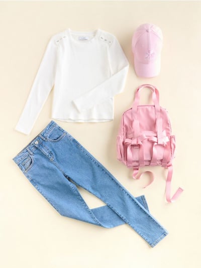 T-shirt with decorative buttons
