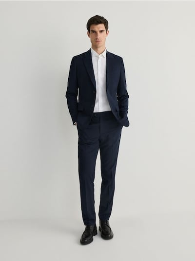 Slim trousers with pressed crease
