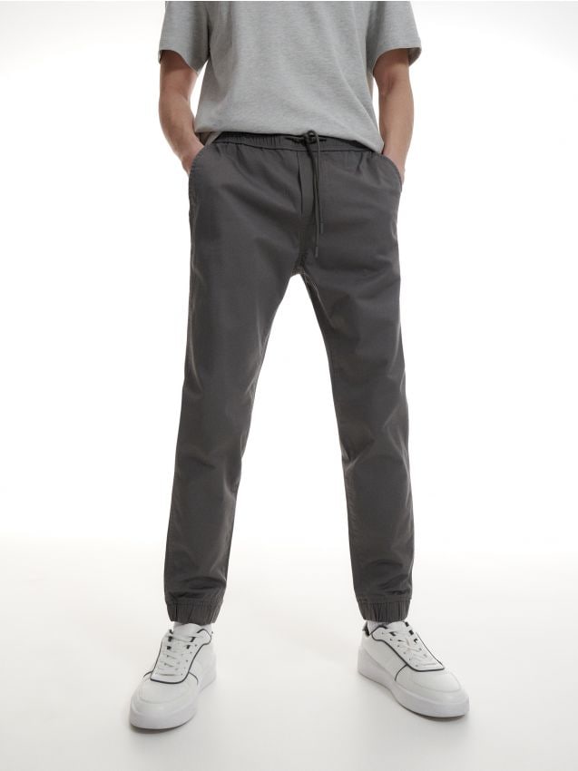 Distressed denim joggers on sale