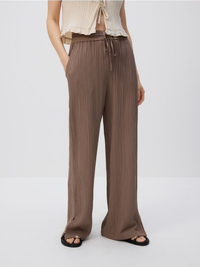 Crease effect trousers - RESERVED