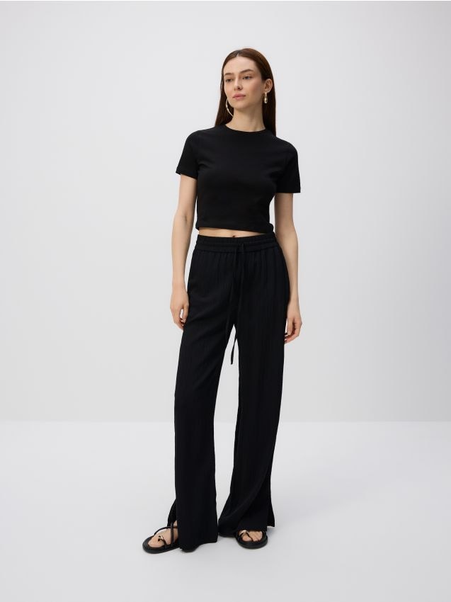 Crease effect trousers - RESERVED