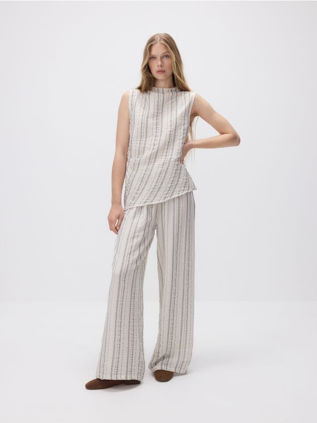Loose trousers with metallic thread - RESERVED