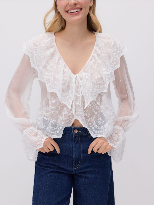 Bluse med flæser - RESERVED