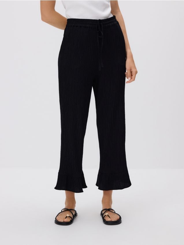 Pants with ruffles - RESERVED