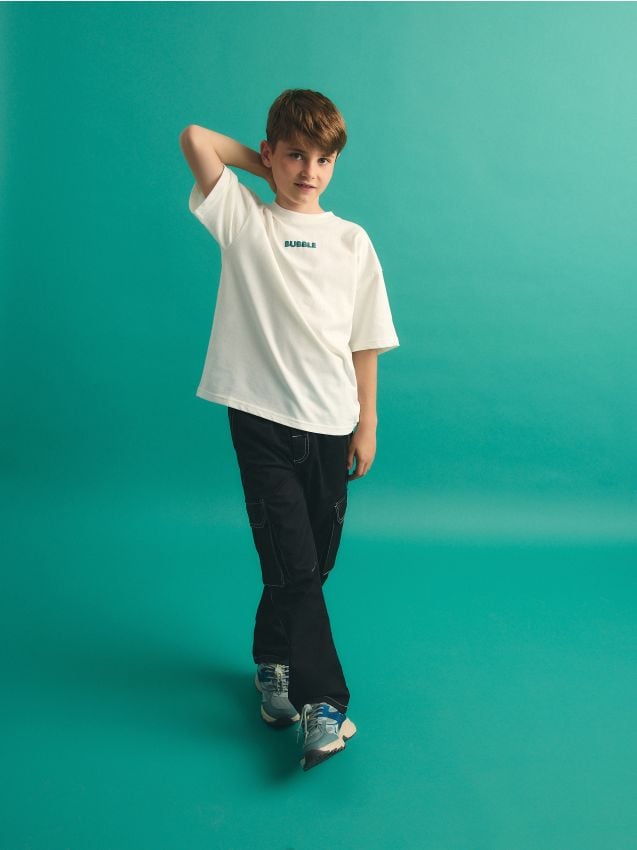 Trousers with contrasting stitching - RESERVED