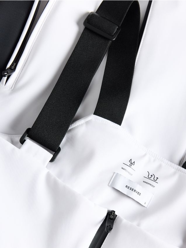 Water repellent trousers with braces - RESERVED