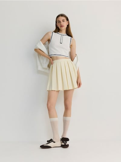 Sports style pleated mini skirt
