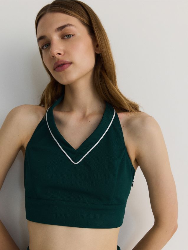 Reserved - top cu umeri decupați în stil sport - verde-închis