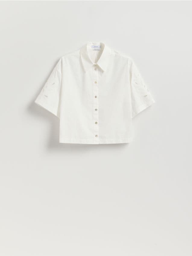 Blouse met opengewerkte mouwen - RESERVED