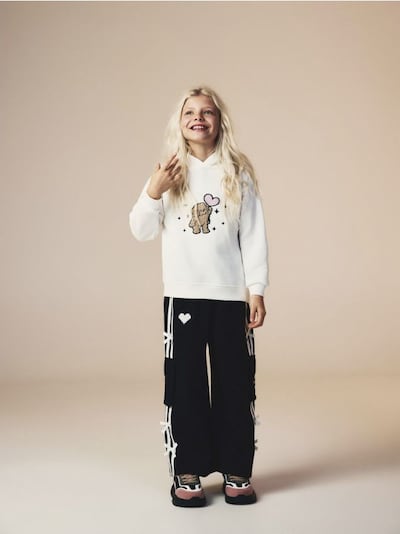 Трикотажні штани з бантиками