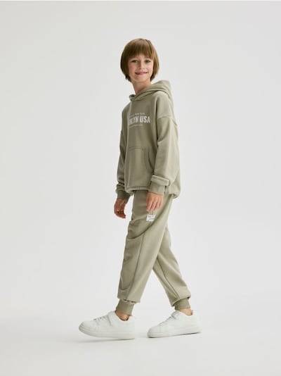 Bavlněné kalhoty Jogger