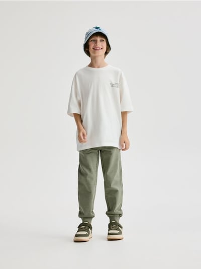 Bavlněné kalhoty joggers