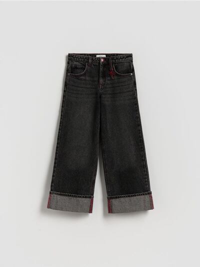 Jean large coupe wide‑leg avec revers