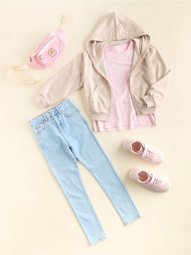 Slim‑fit jeans with heart button - RESERVED