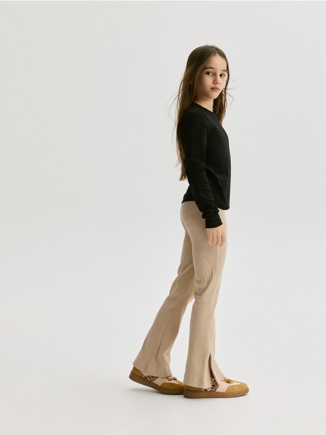 Flare-byxor med slits - RESERVED