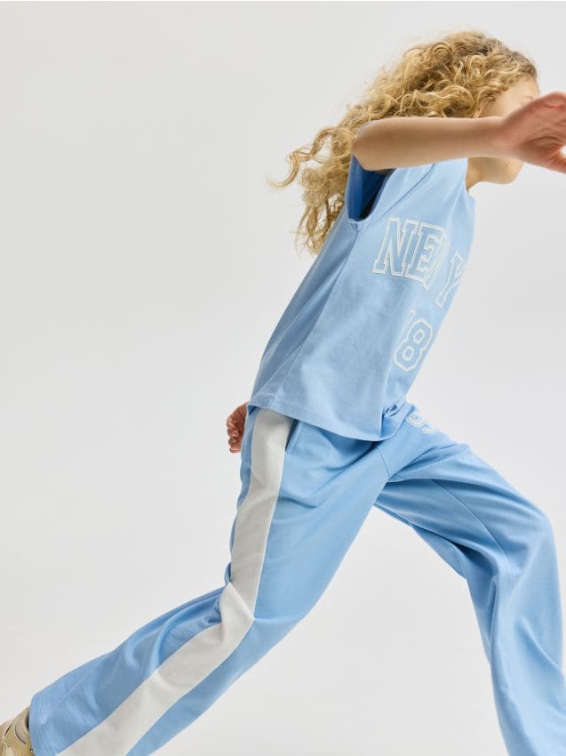 Wide leg trousers with side stripes - RESERVED