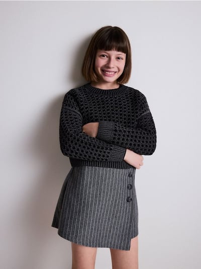 Blizgus ažūrinis megztinis