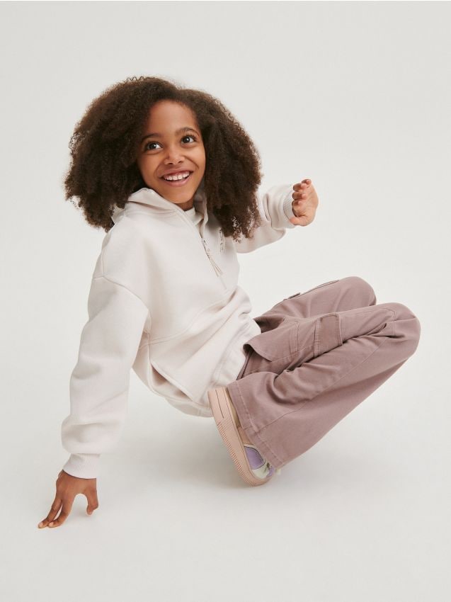 Flare trousers with cargo pockets - RESERVED